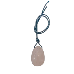 Huevo yoni de mineral cuarzo rosa, para el bienestar femenino y el amor propio.