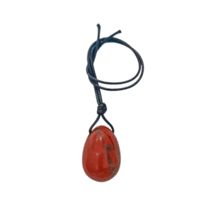 Huevo yoni de mineral jaspe rojo, ideal para la energía y la vitalidad.