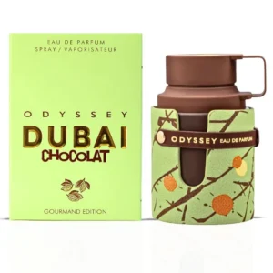 Fotografia real del perfume arabe odyssey dubai chocolat de cien mililitros de la marca armaf mostrando su frasco exclusivo gourmand edition junto a su caja elegante