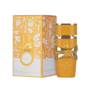 Fotografia real del perfume en aceite yara tous de veinte mililitros de la marca lattafa mostrando su pequeño frasco naranja con detalles dorados junto a su caja elegante