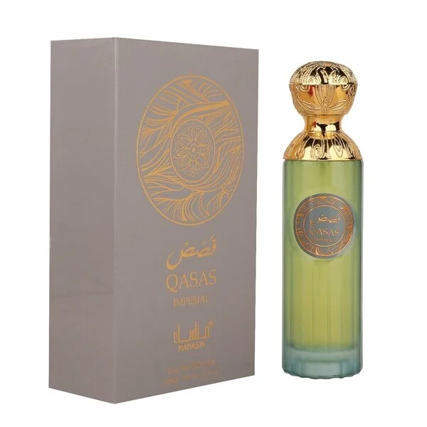 Perfume Arabe Manasik Qasas Bleu Original 👑 Botella de lujo de diseno imponente en tonos azulados del perfume arabe manasik qasas bleu de cien mililitros mostrando sus detalles metalicos y su estuche de gala